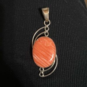 Rare rhodochrosite pendant set in Mexican 925 silver